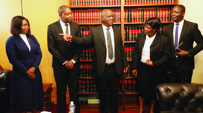Chief Justice Luke Malaba meets the Malawian judicial service delegation in Harare yesterday. — Innocent Makawa