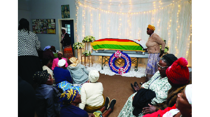 he casket bearing the body of National Hero Cde Ben Mucheche lies in State at his farm in Beatrice yesterday.