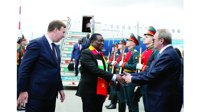 President Mnangagwa is introduced to Russian Federation’s Deputy Minister of Foreign Affairs and Special Presidential Representative for the Middle East and Africa, Mr Mikhail Bogdanov by Mr Igor Viktorovich Bogdashev, Director of State Protocol Department at the Ministry of Foreign Affairs of Russia (left), on arrival at Pulkovo International Airport in St Petersburg, Russia yesterday. — Picture: Presidential Photographer Tawanda Mudimu