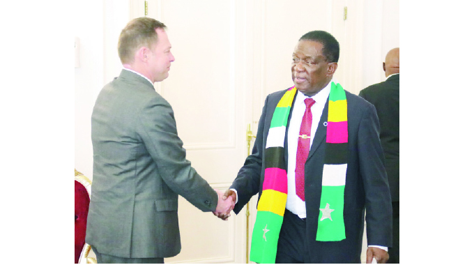 President Mnangagwa welcomes Russia’s Ambassador to Zimbabwe, Mr Nikolai Krasilnikov at State House in Harare yesterday.