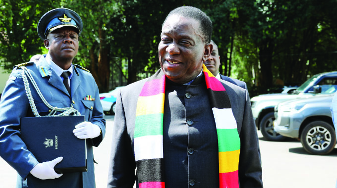 President Mnangagwa jokes with journalists on his way to the first 2024 Cabinet meeting at State House in Harare yesterday. — Picture: Innocent Makawa