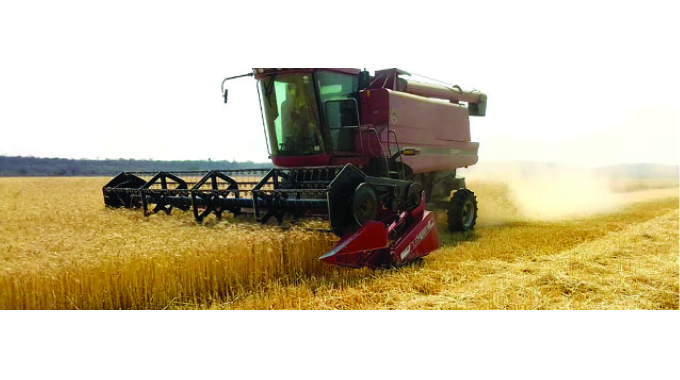 File Photo: A combine harvester at work at the Arda Antelope Estate in Matobo