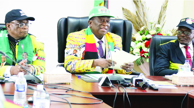President Mnangagwa makes his opening remarks to the Zanu PF Politburo meeting in Harare yesterday flanked by Vice Presidents Constantino Chiwenga (left) and Kembo Mohadi.