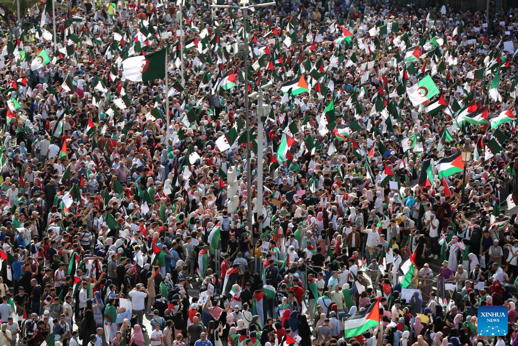 People take part in a protest to voice their support for the Palestinians in Algiers, Algeria, Oct. 19, 2023. (Xinhua)
