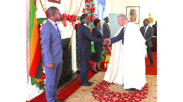 President Mnangagwa receives credentials from newly accredited Algerian Ambassador to Zimbabwe, Mahamed Seoudi, while Acting Foreign Affairs and International Trade Minister Professor Amon Murwira (left) looks on at State House in Harare yesterday.