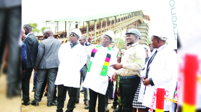 President Mnangagwa shares notes with Vice-President Constantino Chiwenga (left), Mines and Mining Development Minister Zhemu Soda (right) and Dallaglio general manager Engineer Alfred Madowe during the commissioning of Pickstone Mine in Chegutu yesterday.
