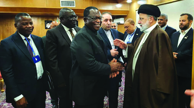 Vice President Dr Constantino Chiwenga converses with Iranian President Ebrahim Raisi after their closed-door meeting on the sidelines of the Iran-Africa International Economic Conference in Tehran, Iran, yesterday.