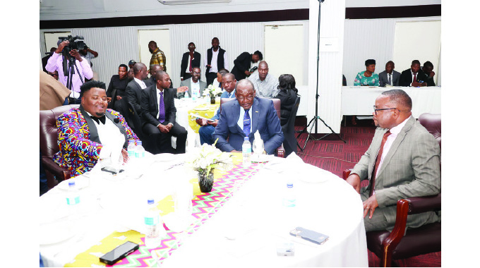 Vice President Kembo Mohadi, flanked by Skills Audit and Development Minister Paul Mavima (right) and Vision 2030 Movement chairperson Tapiwa Mavima at the Public, Private Sector Business Interface Dinner hosted by the movement in Bulawayo on Friday.